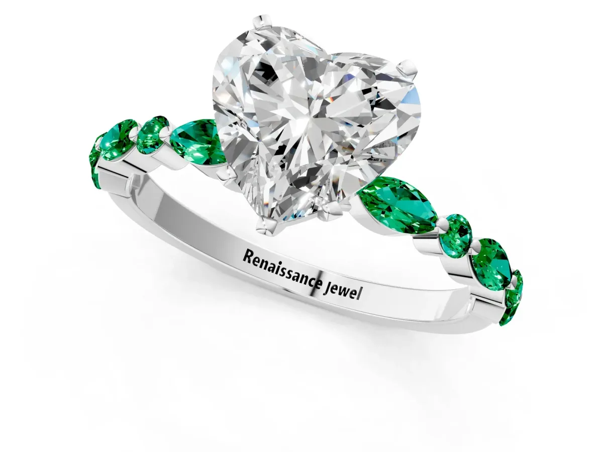 Heart Cut Diamond Ring with Marquise and Round Emerald Side Stones and Four-Prong Setting Platinum