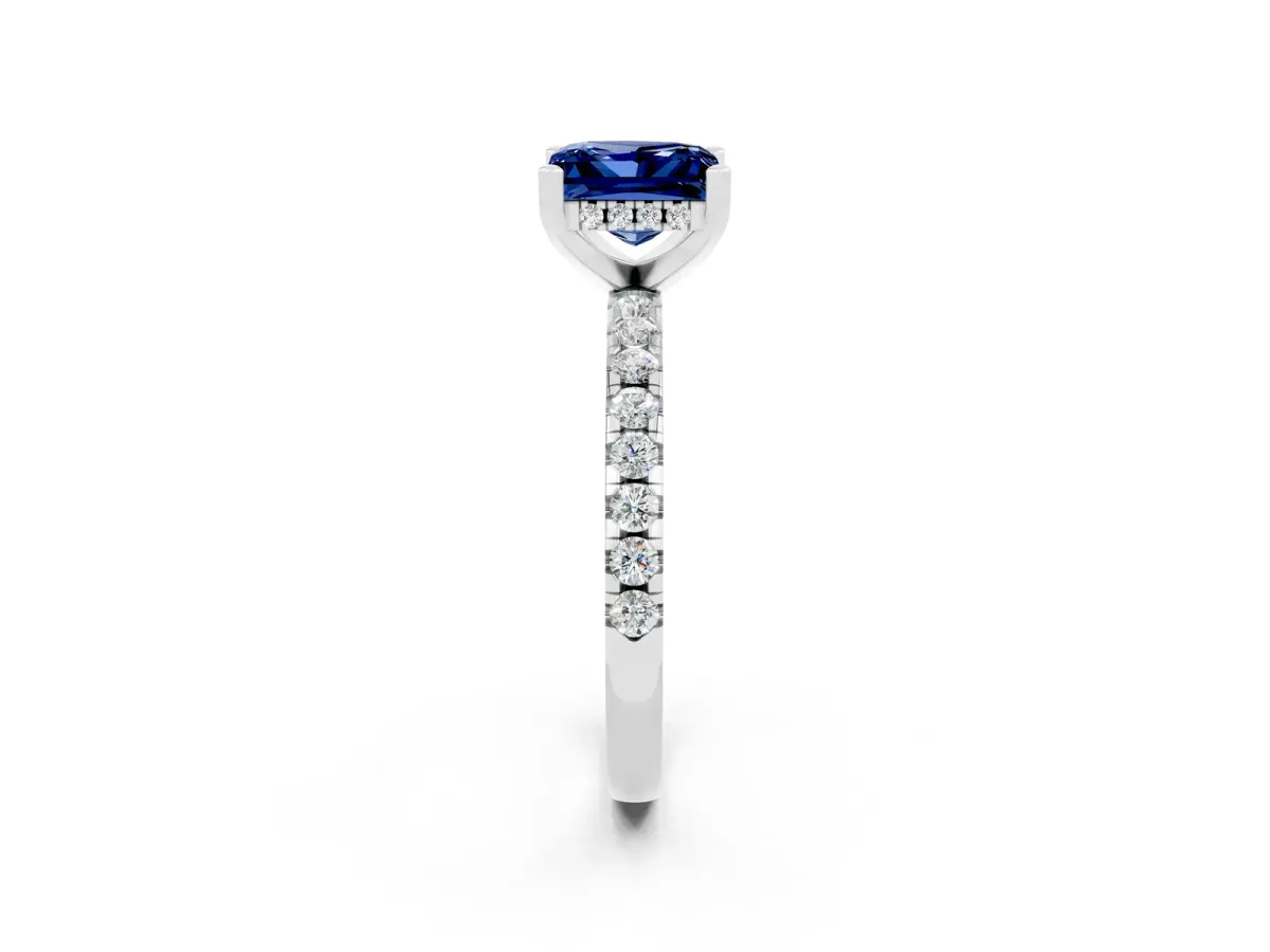 Princess Cut Blue Sapphire Solitaire Ring with Round Pavé Band and Four-Prong Setting Silver
