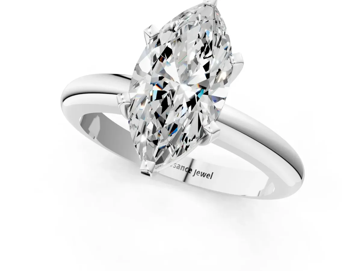 Marquise Cut Diamond Solitaire Engagement Ring with Round Band and Four-Prong Setting Platinum
