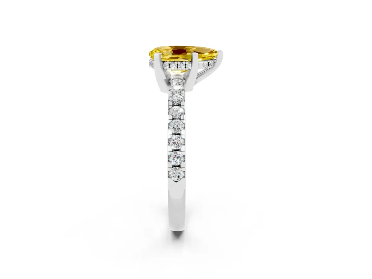 Pear Cut Yellow Sapphire Solitaire Ring with Round Pavé Band and Four-Prong Setting Platinum