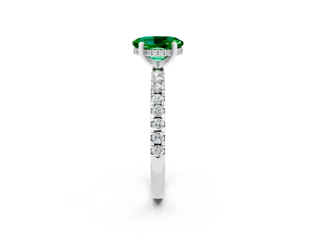 Oval Cut Emerald Solitaire Ring with Round Pavé Band and Four-Prong Setting Silver