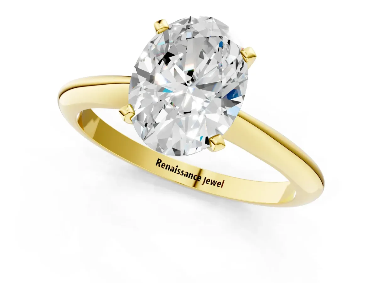 Oval Cut Diamond Solitaire Engagement Ring with Classic Band and Four-Prong Setting Yellow gold