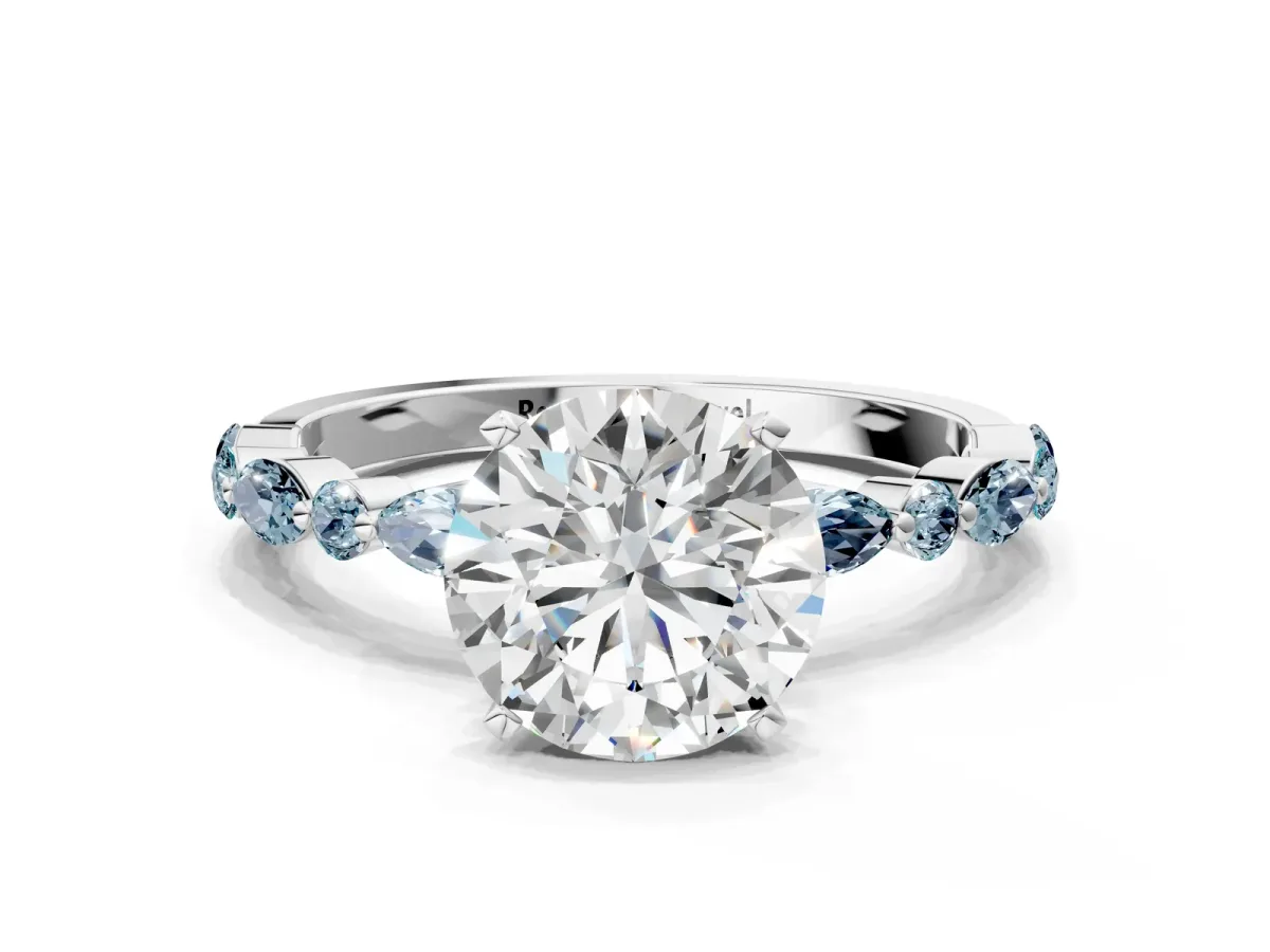 Round Cut Diamond Ring with Marquise and Round Aquamarine Side Stones and Four-Prong Setting Platinum