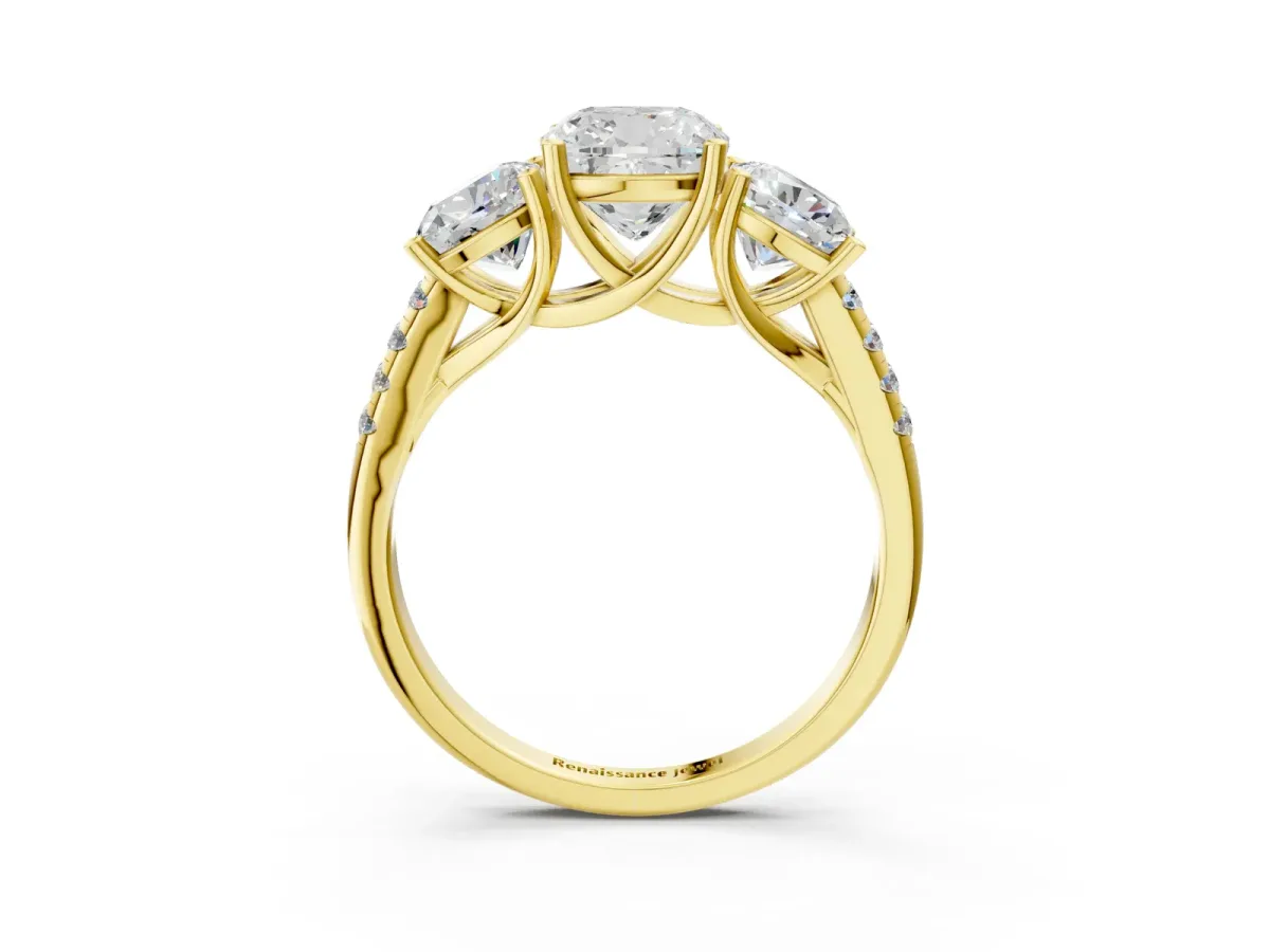 Fancy Black Three-Stone Cushion Cut Diamond Ring with Round Pavé Band and Prong Setting Yellow gold