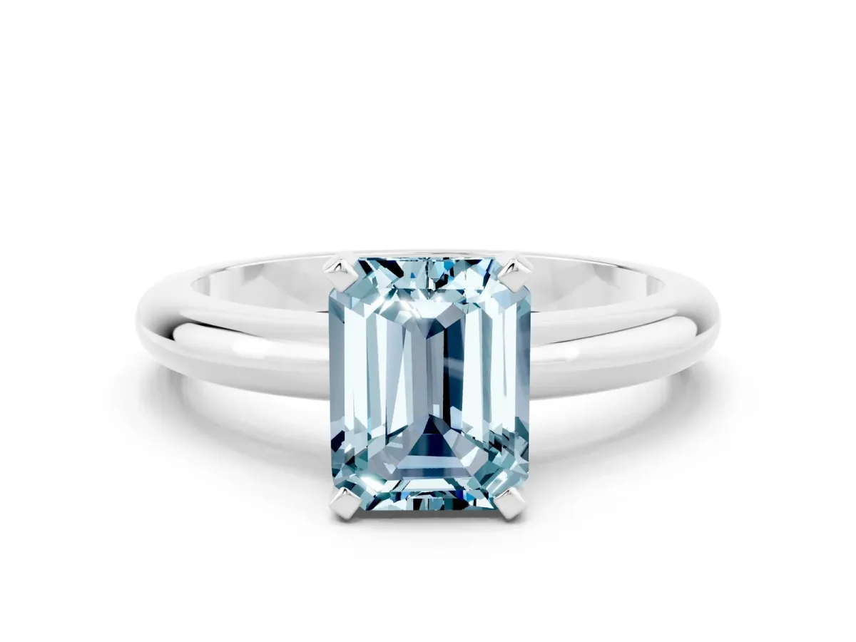 Emerald Cut Aquamarine Solitaire Engagement Ring with Round Band and Four-Prong Setting Platinum