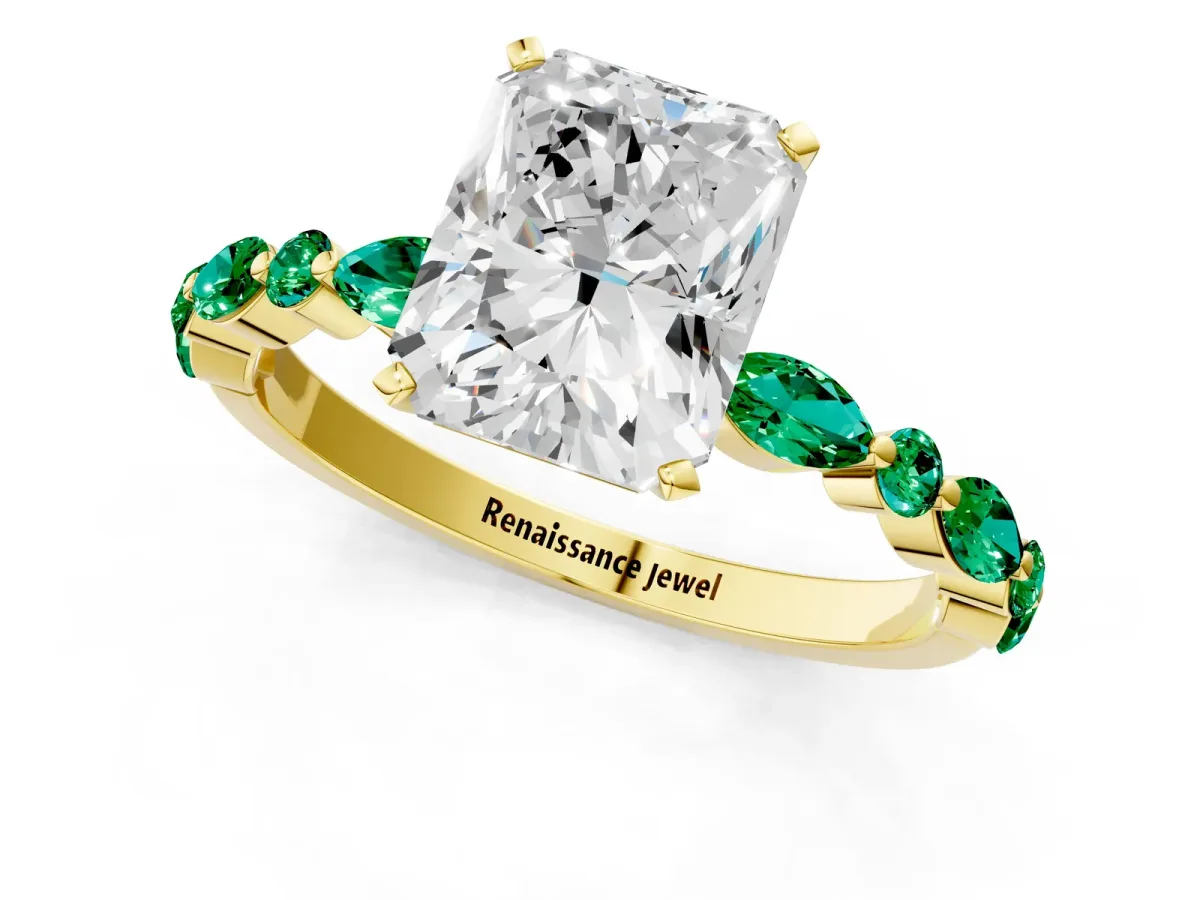 Radiant Cut Diamond Ring with Marquise and Round Emerald Side Stones and Four-Prong Setting Yellow gold