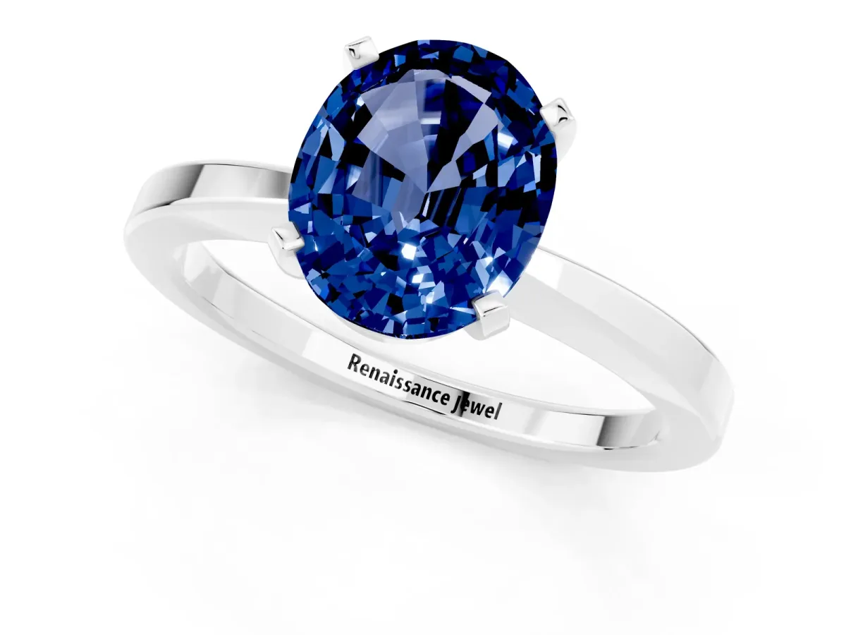 Oval Cut Blue Sapphire Solitaire Engagement Ring with Classic Band and Four-Prong Setting Platinum