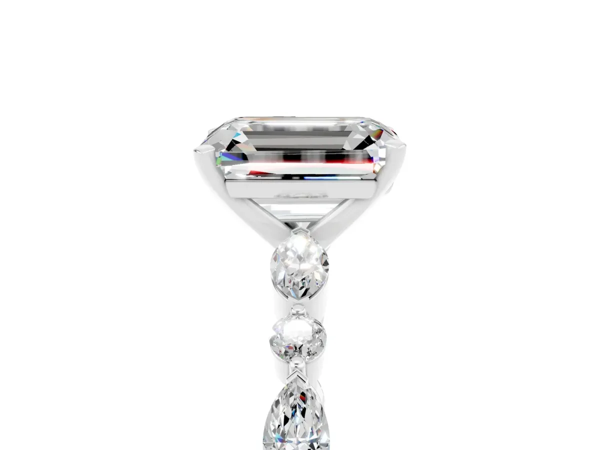 Emerald Cut Moissanite Ring with Marquise and Round Side Stones and Four-Prong Setting Silver