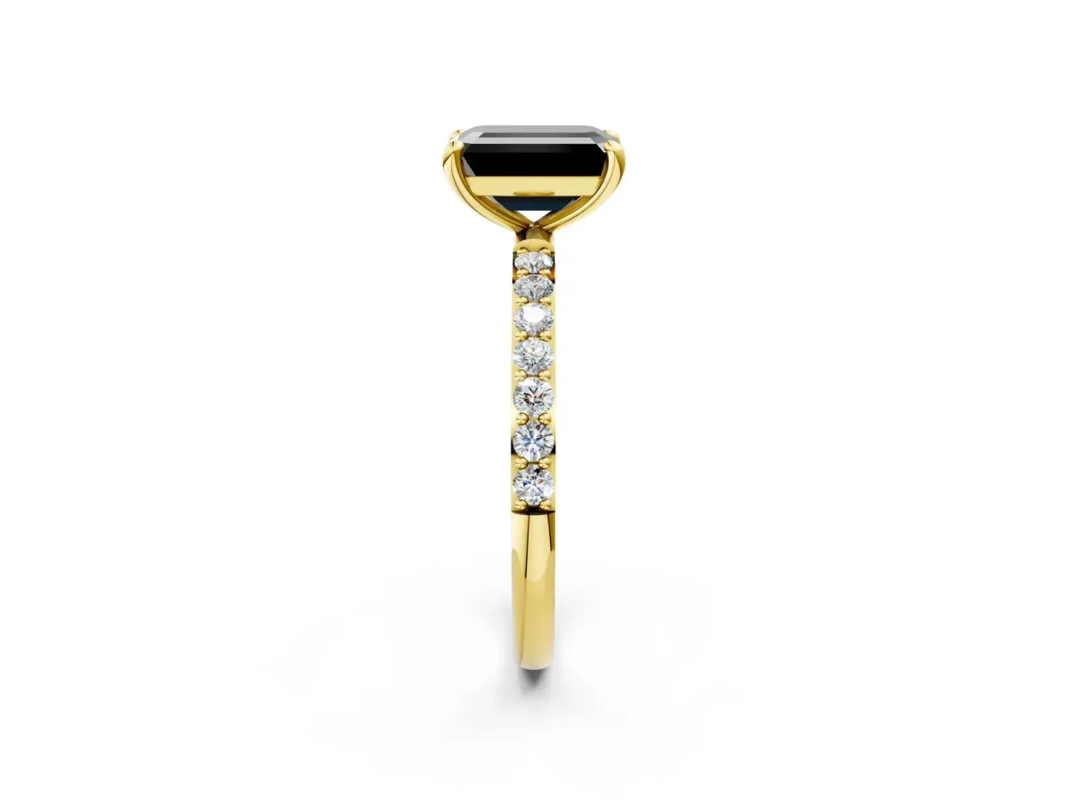 Fancy Black Emerald Cut Diamond Solitaire Ring with Round Pavé Band and Prong Setting Yellow gold