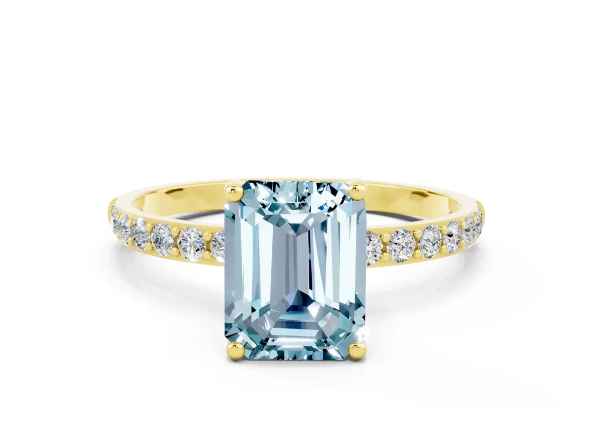 Emerald Cut Aquamarine Solitaire Ring with Round Pavé Band and Prong Setting Yellow gold
