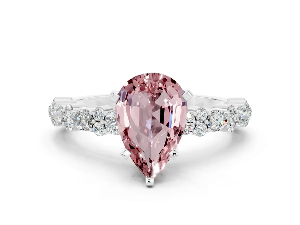 Pear Cut Morganite Side Stone Solitaire Ring with Round and Four-Prong Setting Platinum