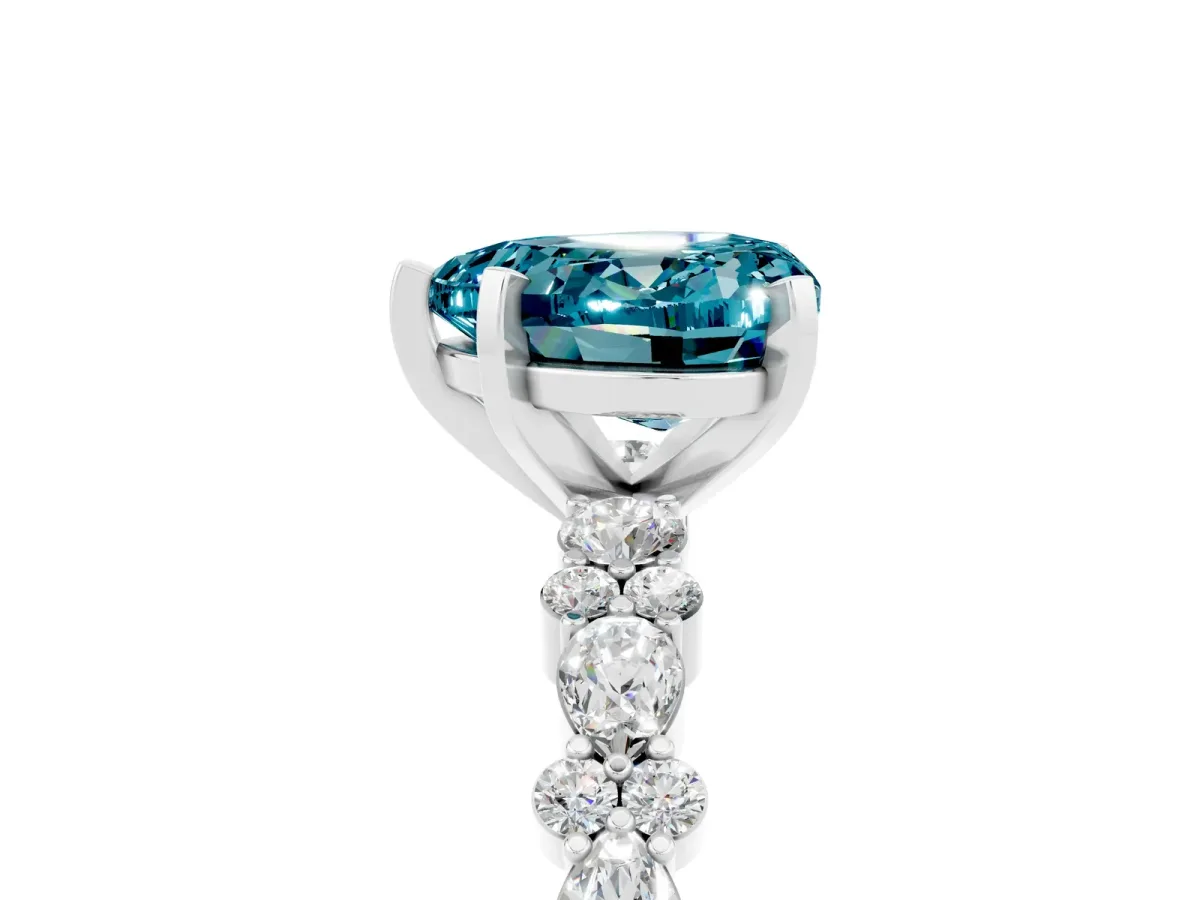 Heart Cut Blue Topaz Side Stone Solitaire Ring with Round and Four-Prong Setting Platinum