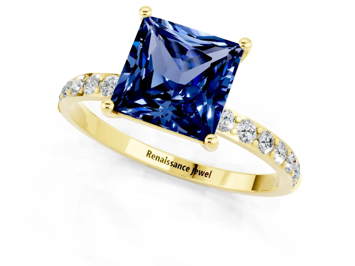 Princess Cut Blue Sapphire Solitaire Ring with Round Pavé Band and Prong Setting Yellow gold