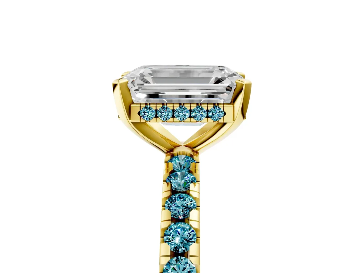 Emerald Cut Diamond Solitaire Ring with Round Blue Topaz Pavé Band and Four-Prong Setting Yellow gold