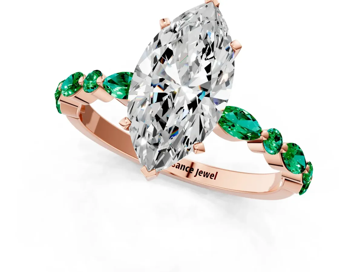 Marquise Cut Diamond Ring with Marquise and Round Emerald Side Stones and Four-Prong Setting Rose gold