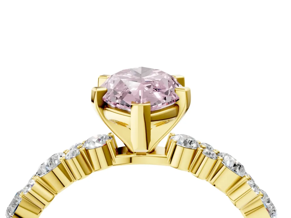 Fancy Pink Marquise Cut Diamond Side Stone Solitaire Ring with Round and Four-Prong Setting Yellow gold