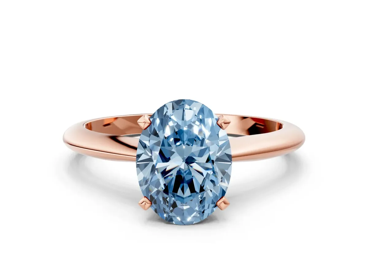Fancy Blue Oval Cut Diamond Solitaire Engagement Ring with Classic Band and Four-Prong Setting Rose gold