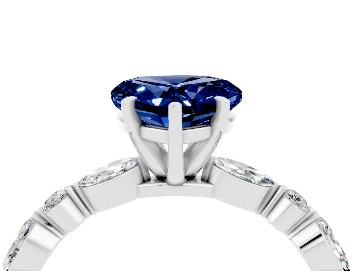 Heart Cut Blue Sapphire Ring with Marquise and Round Side Stones and Four-Prong Setting Silver