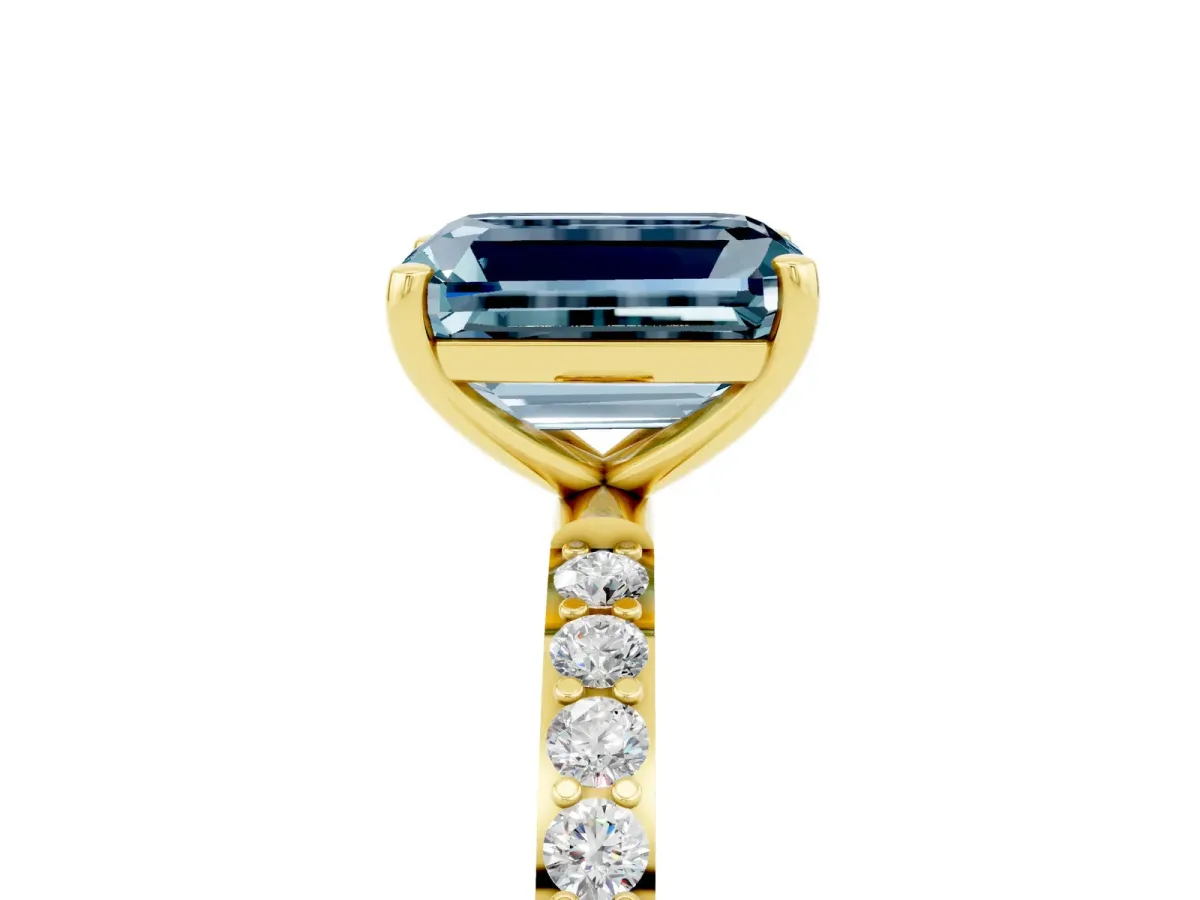 Emerald Cut Aquamarine Solitaire Ring with Round Pavé Band and Prong Setting Yellow gold