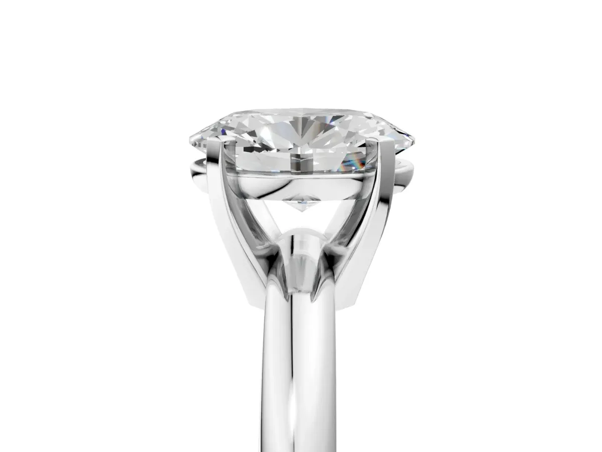Oval Cut Diamond Solitaire Engagement Ring with Round Band and Four-Prong Setting White gold