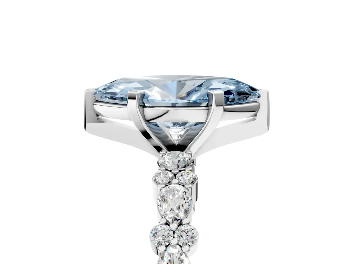 Fancy Blue Marquise Cut Diamond Side Stone Solitaire Ring with Round and Four-Prong Setting Silver