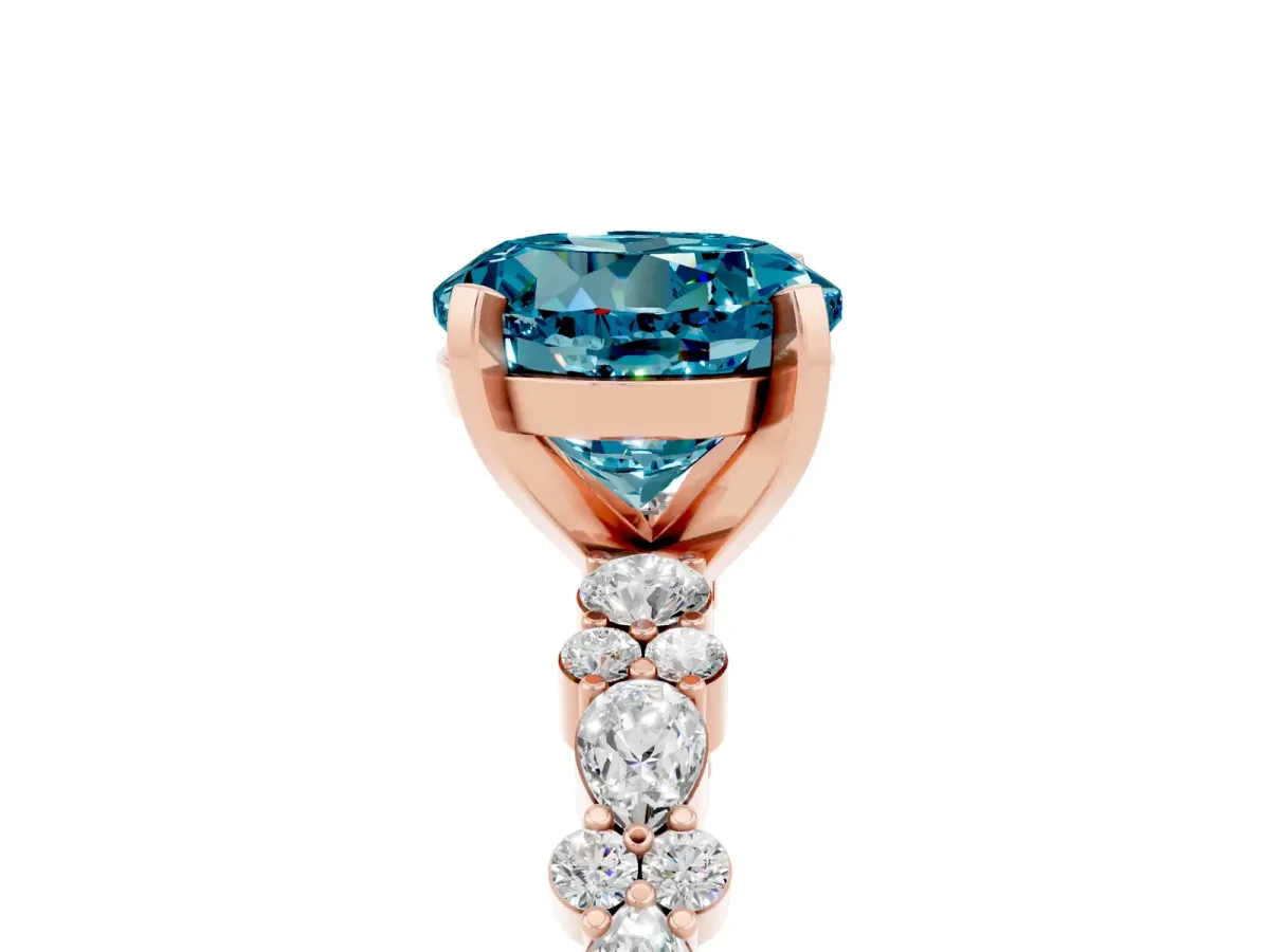 Round Cut Blue Topaz Side Stone Solitaire Ring with Round and Four-Prong Setting Rose gold