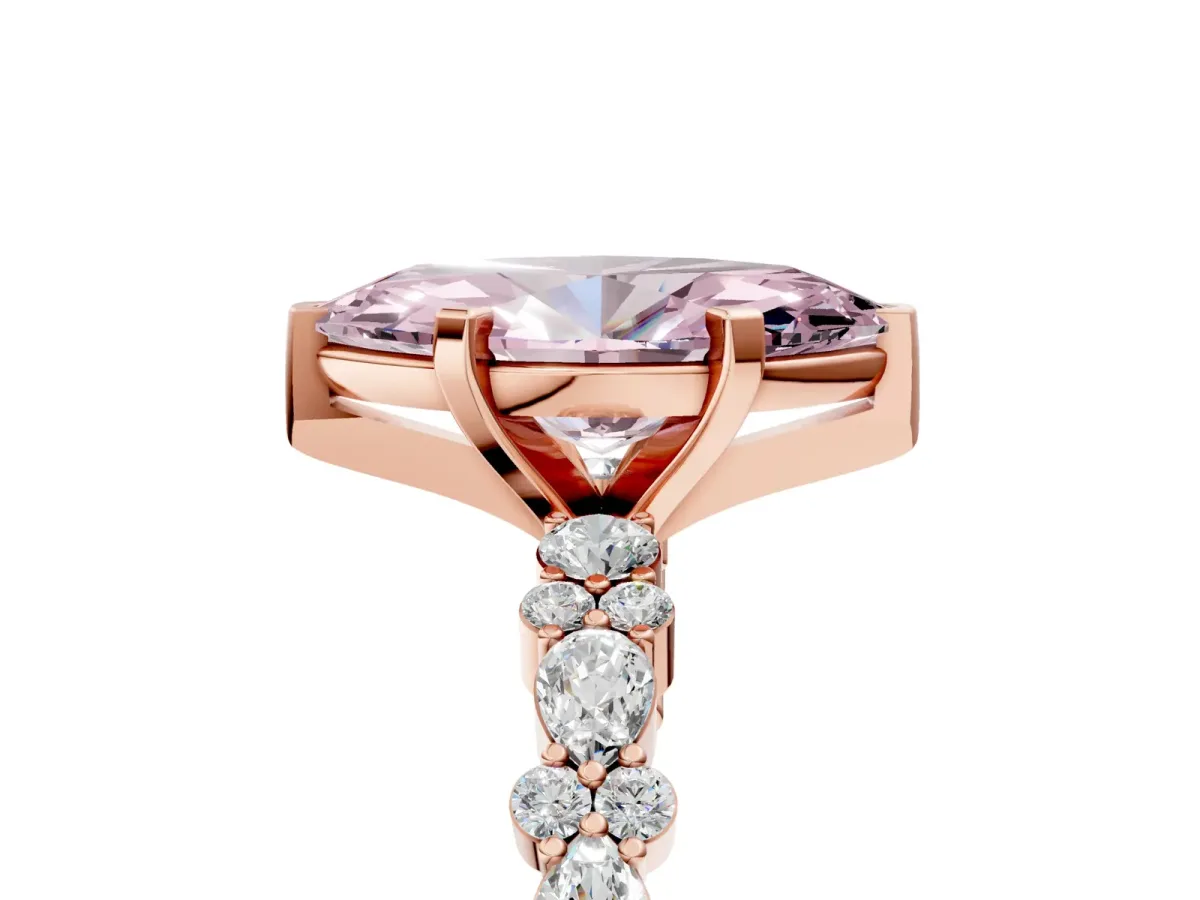 Fancy Pink Marquise Cut Diamond Side Stone Solitaire Ring with Round and Four-Prong Setting Rose gold