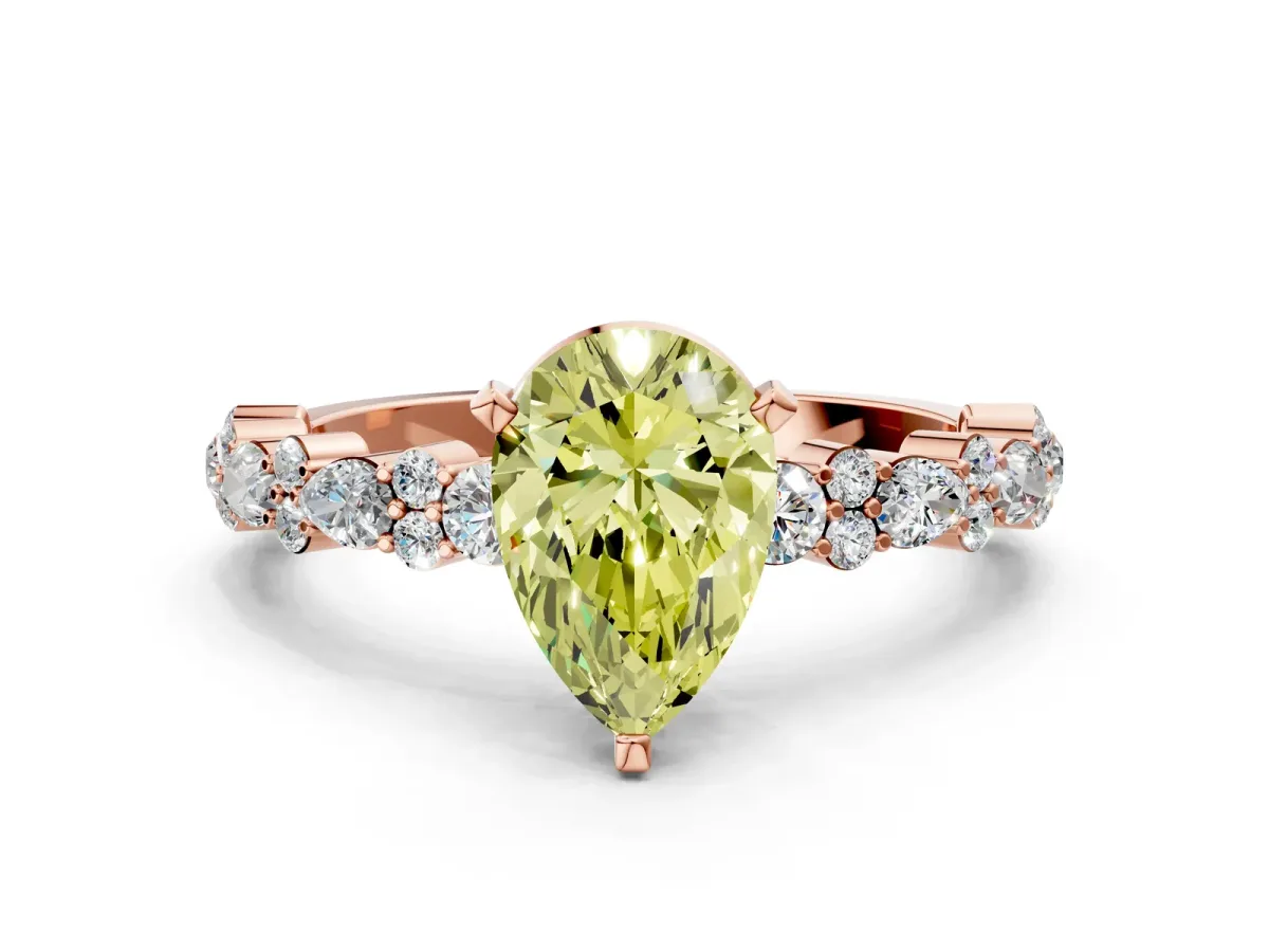 Fancy Yellow Pear Cut Diamond Side Stone Solitaire Ring with Round and Four-Prong Setting Rose gold
