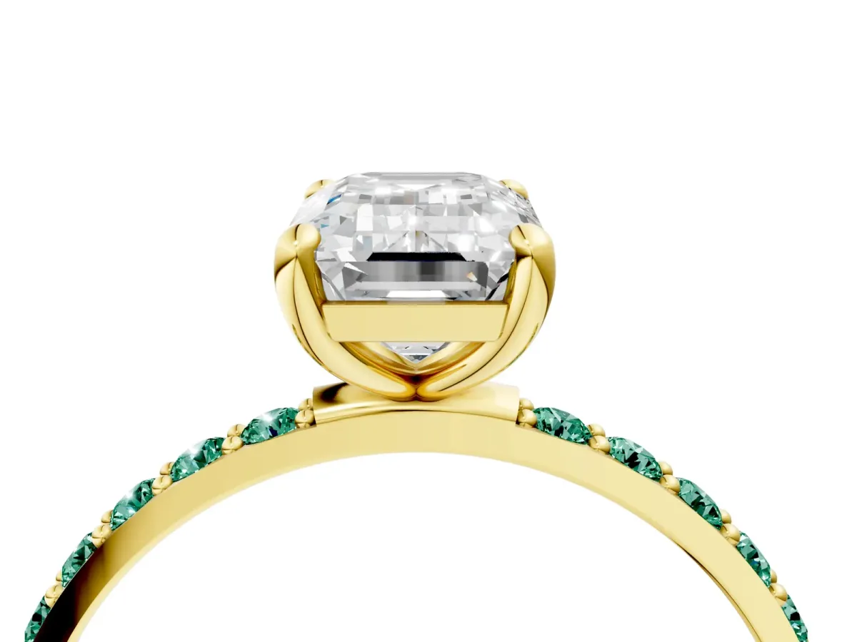 Emerald Cut Diamond Solitaire Ring with Round Green Sapphire Pavé Band and Prong Setting Yellow gold