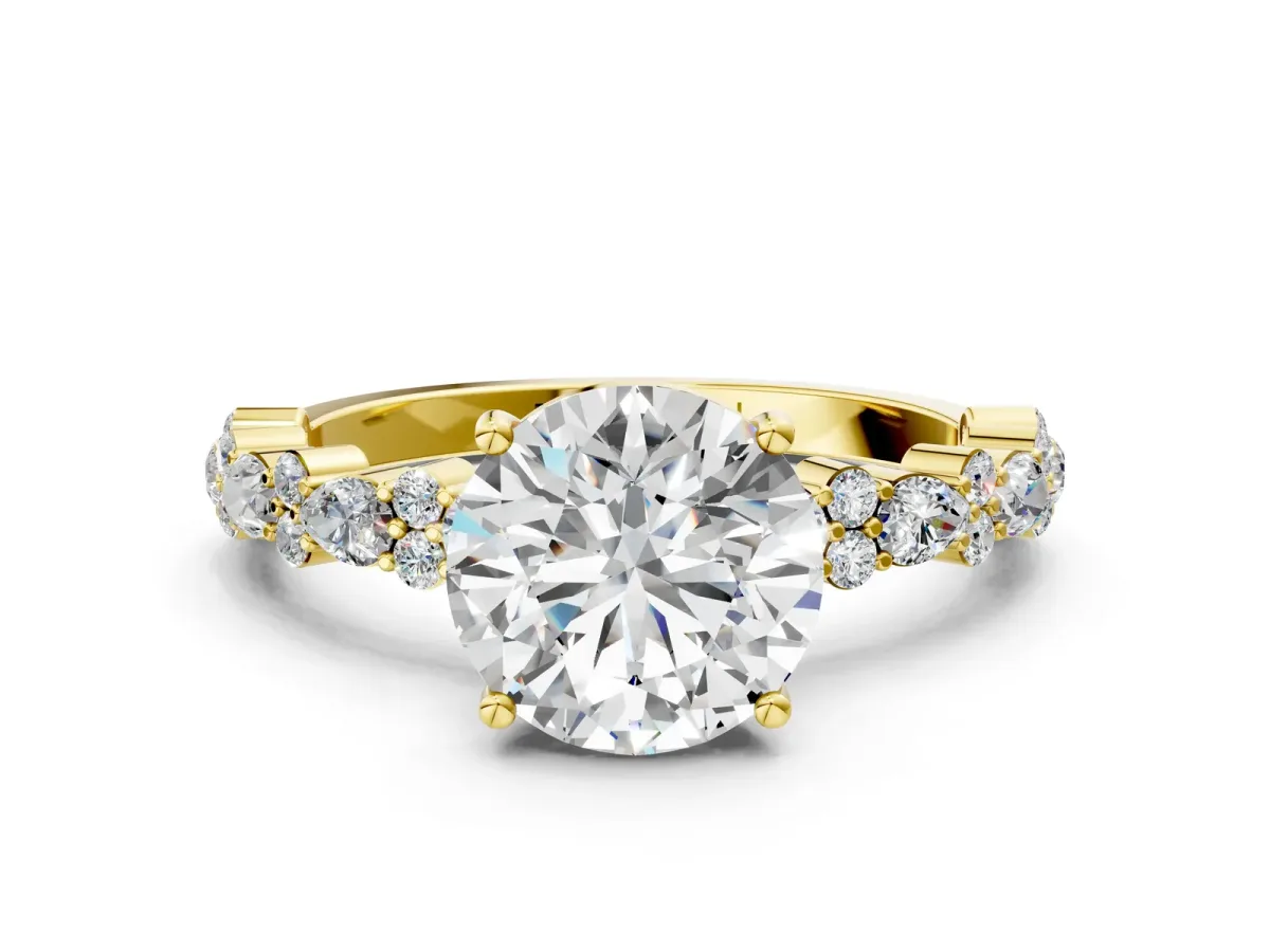Round Cut Diamond Side Stone Solitaire Ring with Round and Four-Prong Setting Yellow gold