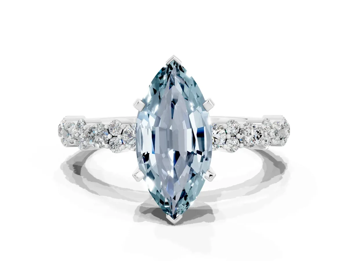 Marquise Cut Aquamarine Side Stone Solitaire Ring with Round and Four-Prong Setting Silver