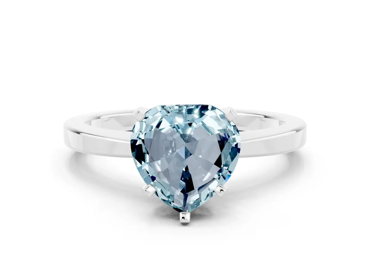 Heart Cut Aquamarine Solitaire Engagement Ring with Classic Band and Four-Prong Setting Silver