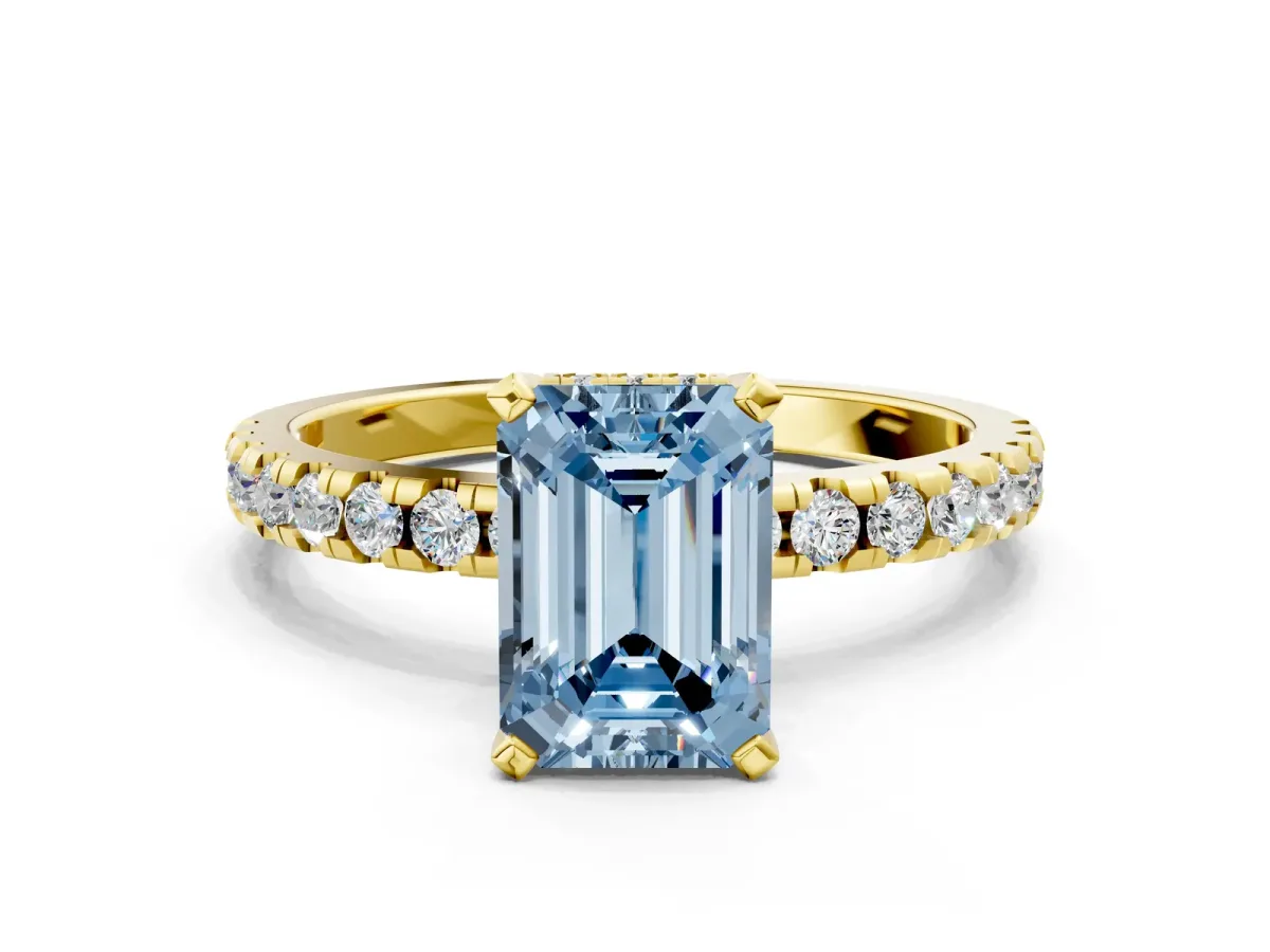 Fancy Blue Emerald Cut Diamond Solitaire Ring with Round Pavé Band and Four-Prong Setting Yellow gold