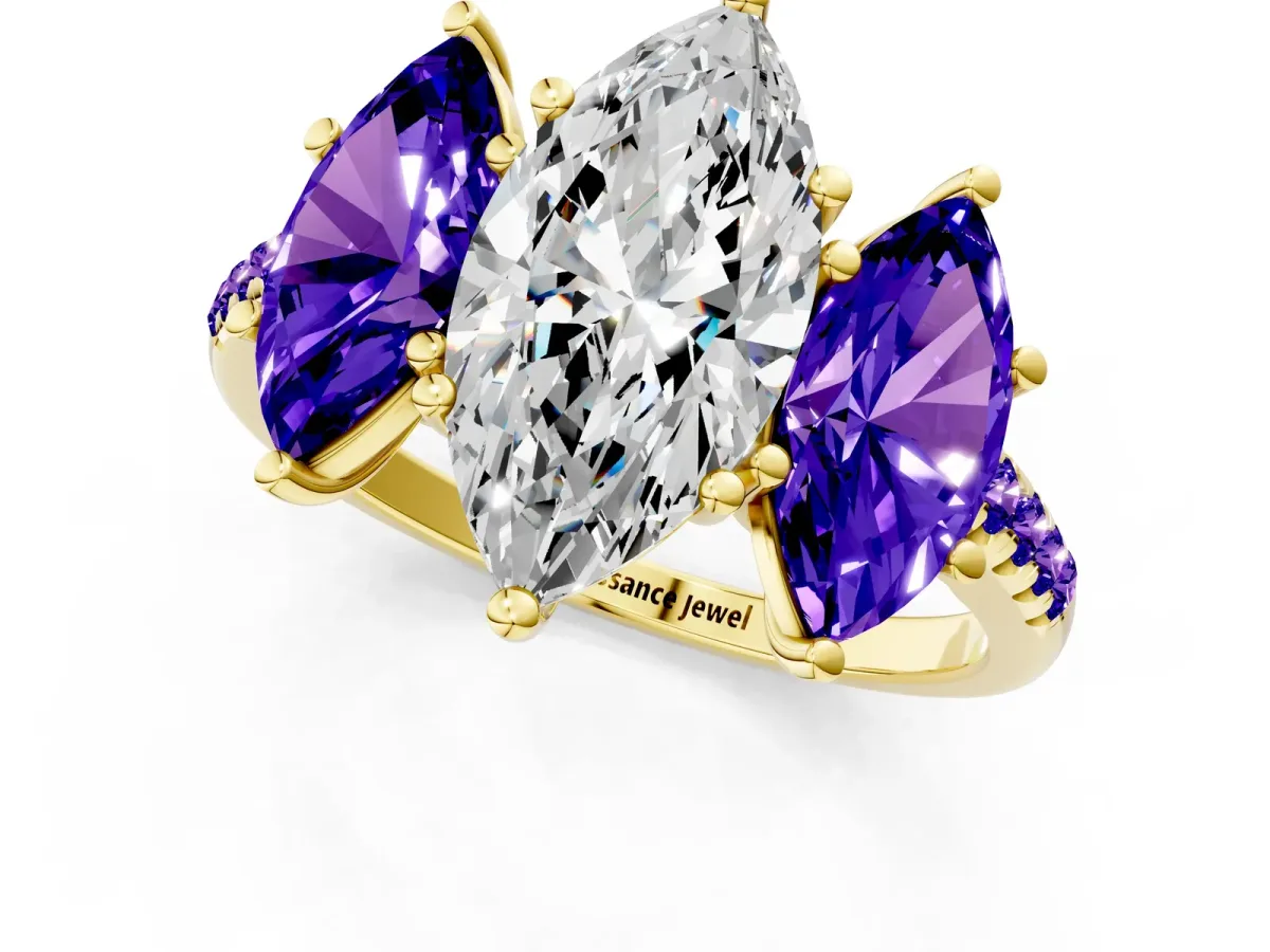 Three-Stone Marquise Cut Diamond Ring with Round Tanzanite Pavé Band and Prong Setting Yellow gold