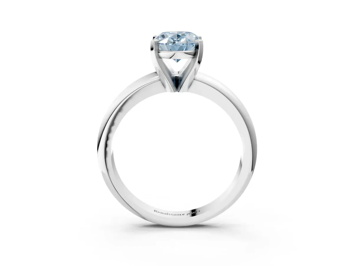 Fancy Blue Oval Cut Diamond Solitaire Engagement Ring with Round Band and Four-Prong Setting White gold