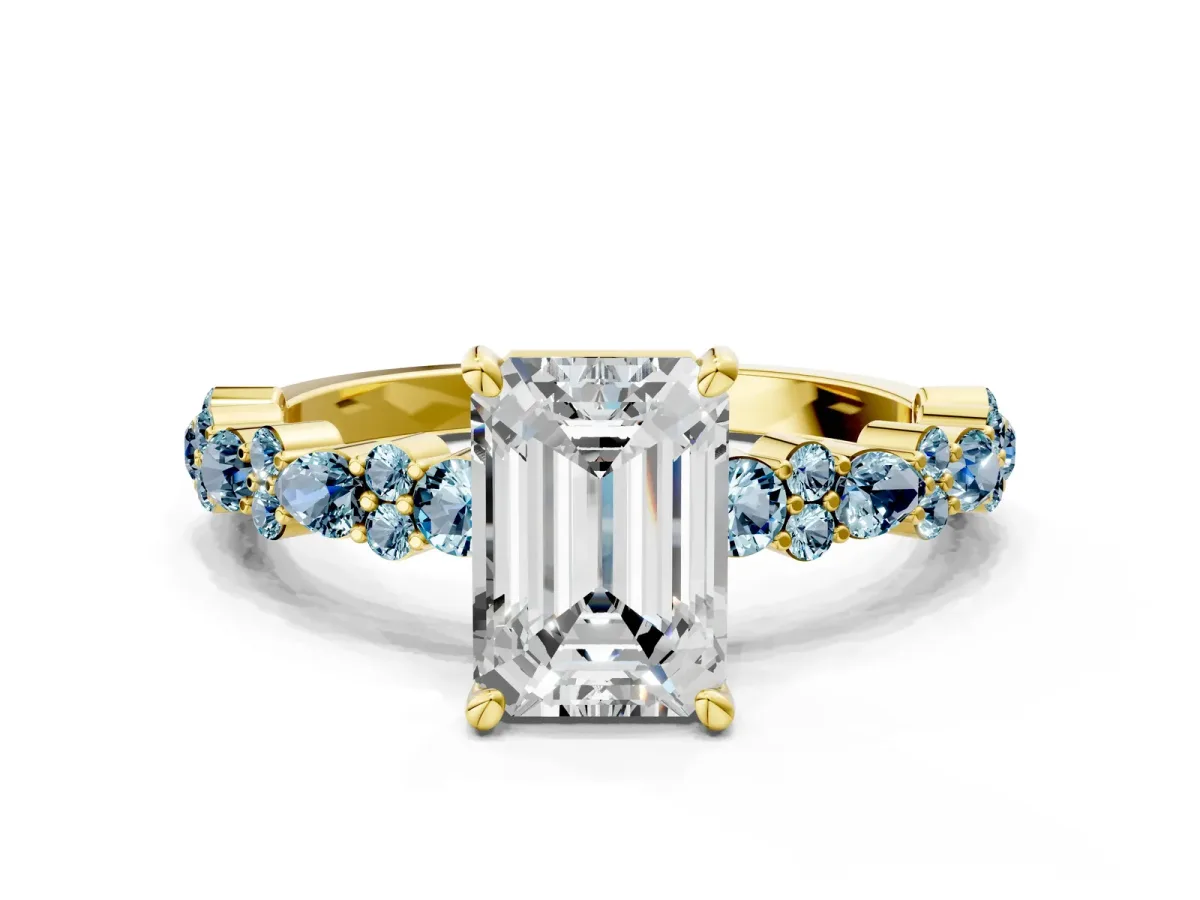 Emerald Cut Diamond Side Stone Solitaire Ring with Round Aquamarine and Four-Prong Setting Yellow gold