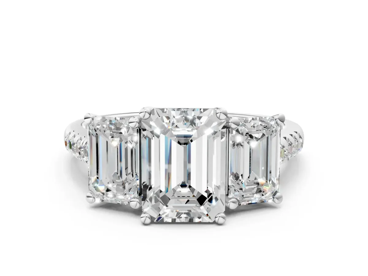 Three-Stone Emerald Cut Diamond Ring with Round Moissanite Pavé Band and Prong Setting White gold