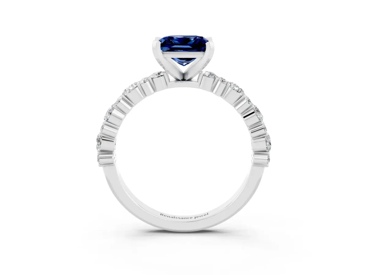 Princess Cut Blue Sapphire Side Stone Solitaire Ring with Round and Four-Prong Setting Platinum