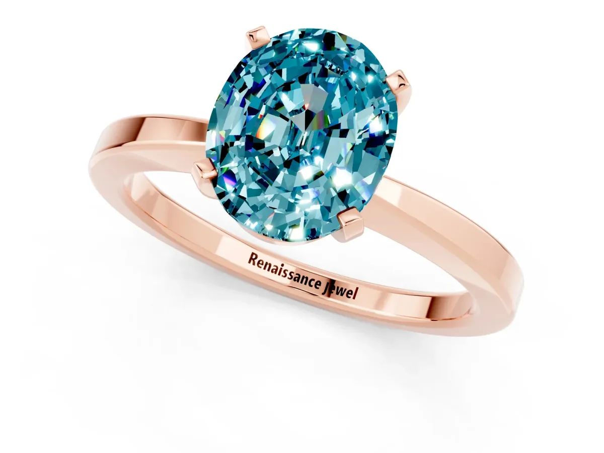 Oval Cut Blue Topaz Solitaire Engagement Ring with Classic Band and Four-Prong Setting Rose gold