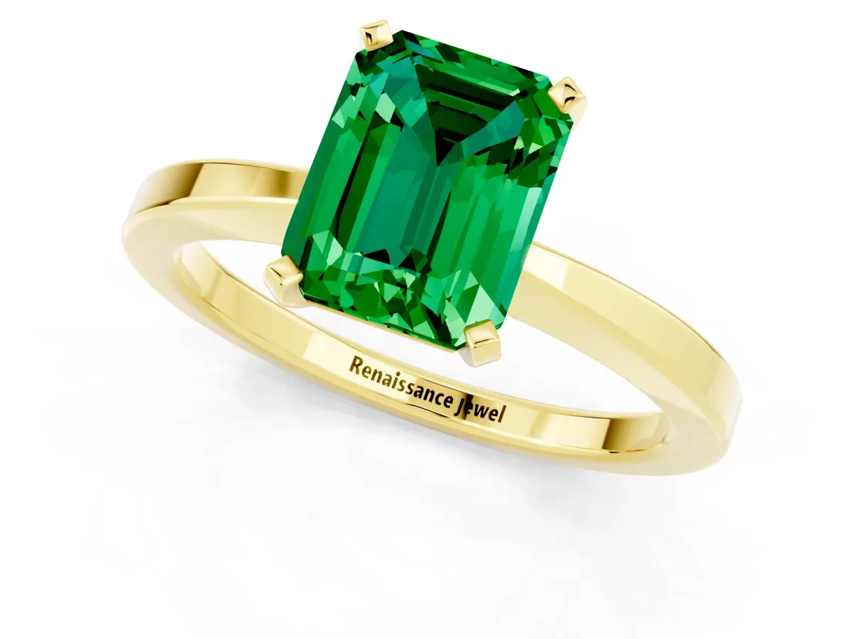 Emerald Cut Emerald Solitaire Engagement Ring with Classic Band and Four-Prong Setting Yellow gold