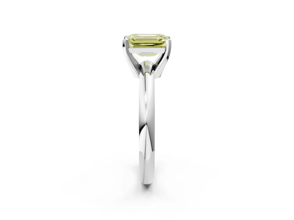 Fancy Yellow Emerald Cut Diamond Solitaire Engagement Ring with Round Band and Four-Prong Setting White gold