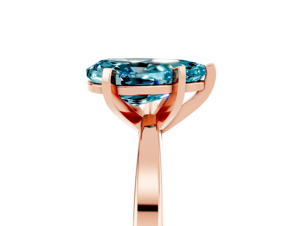 Pear Cut Blue Topaz Solitaire Engagement Ring with Classic Band and Four-Prong Setting Rose gold
