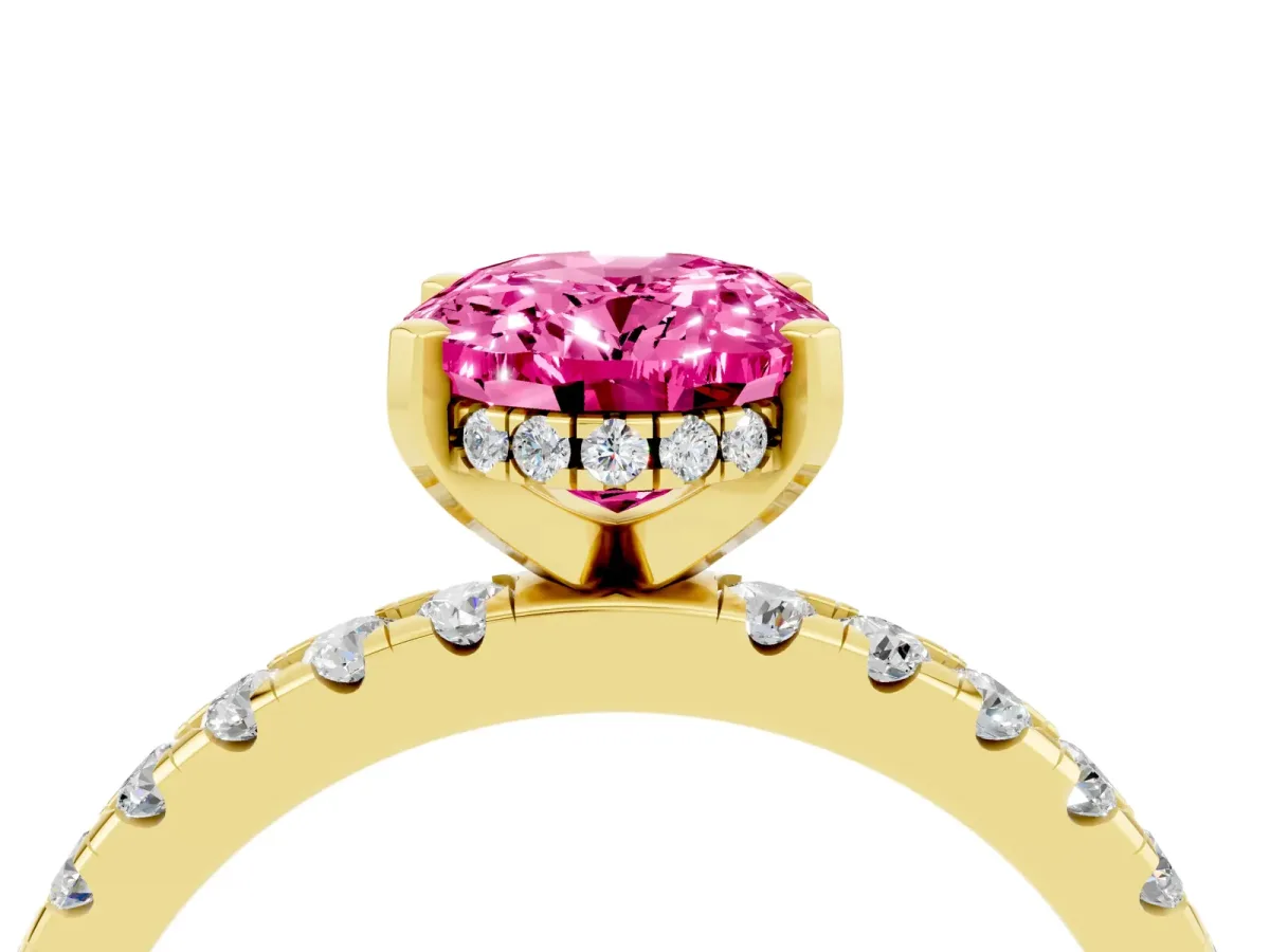 Oval Cut Pink Sapphire Solitaire Ring with Round Pavé Band and Four-Prong Setting Yellow gold