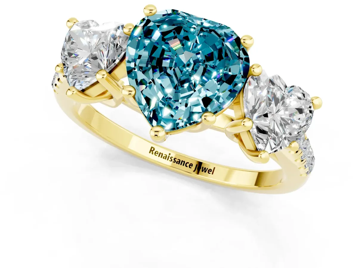 Three-Stone Heart Cut Blue Topaz Ring with Round Pavé Band and Prong Setting Yellow gold