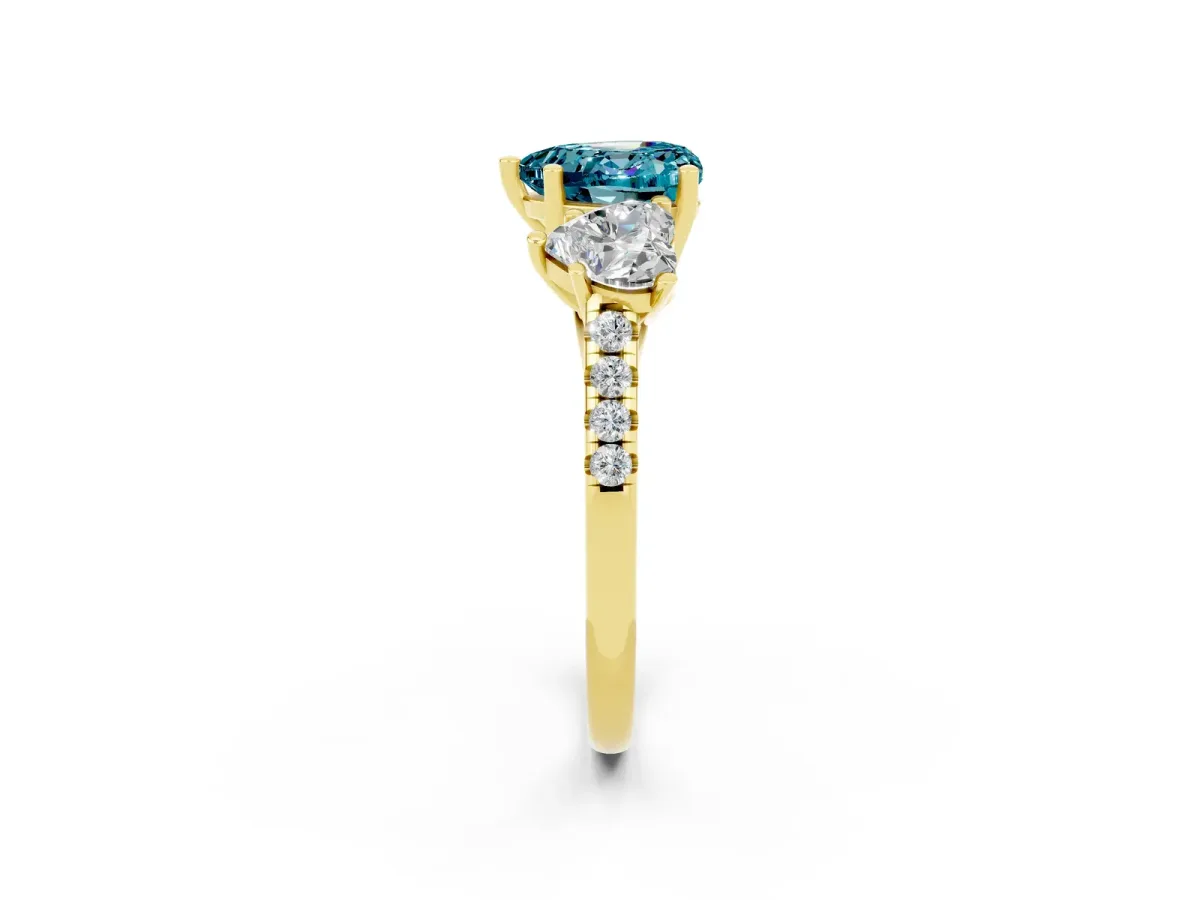 Three-Stone Heart Cut Blue Topaz Ring with Round Pavé Band and Prong Setting Yellow gold