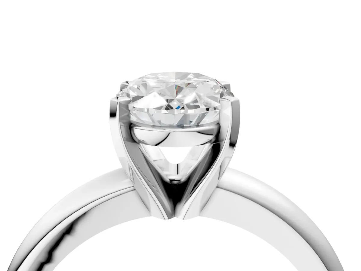 Oval Cut Diamond Solitaire Engagement Ring with Round Band and Four-Prong Setting White gold