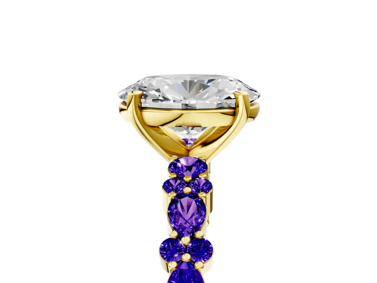 Oval Cut Diamond Side Stone Solitaire Ring with Round Tanzanite and Four-Prong Setting Yellow gold