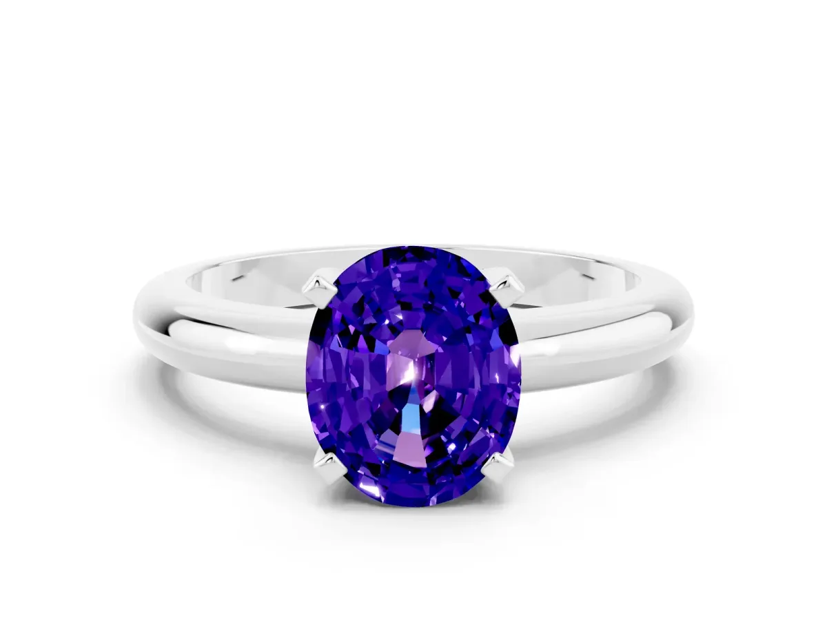 Oval Cut Tanzanite Solitaire Engagement Ring with Round Band and Four-Prong Setting Platinum