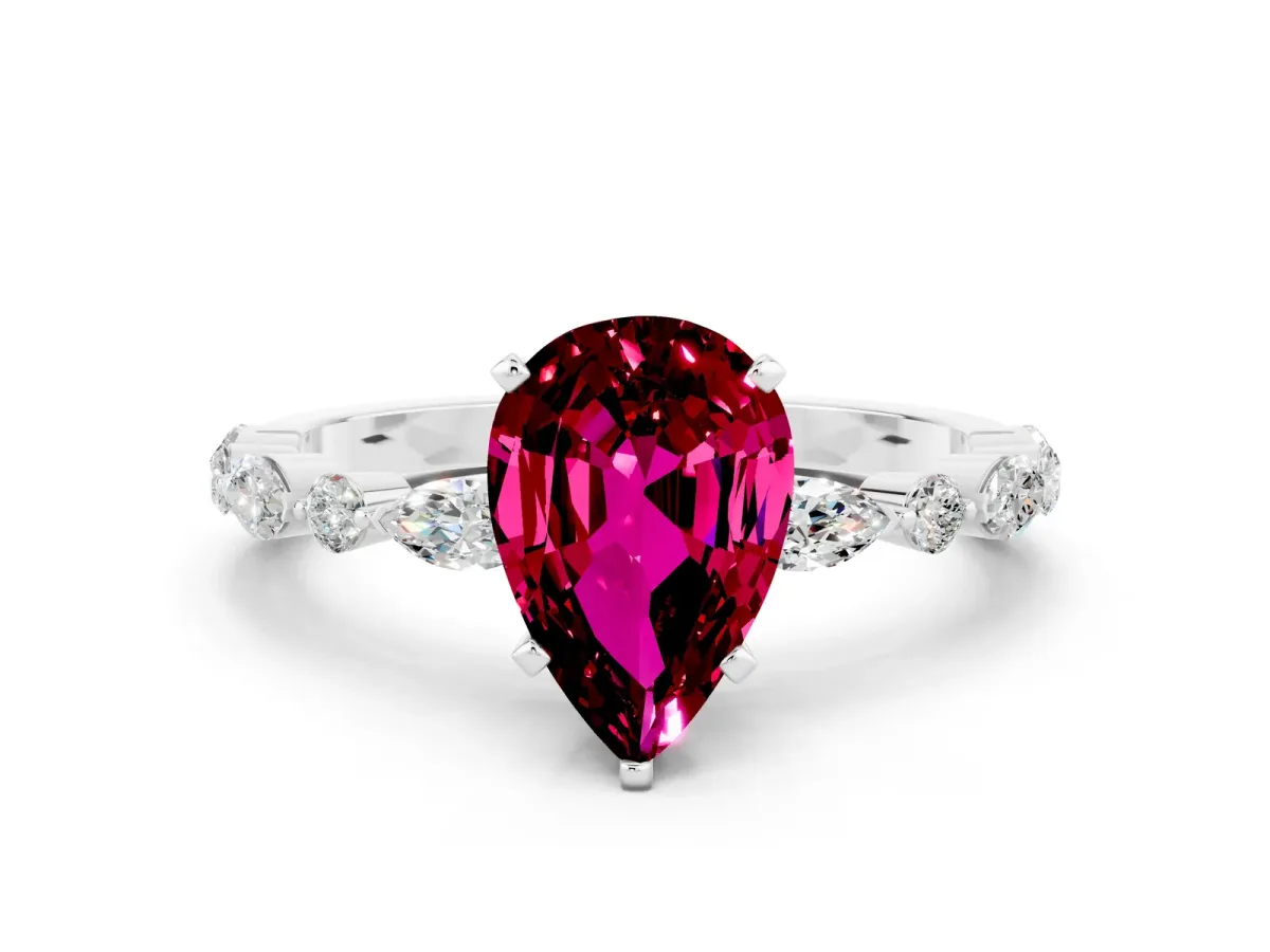 Pear Cut Garnet Ring with Marquise and Round Side Stones and Four-Prong Setting Silver