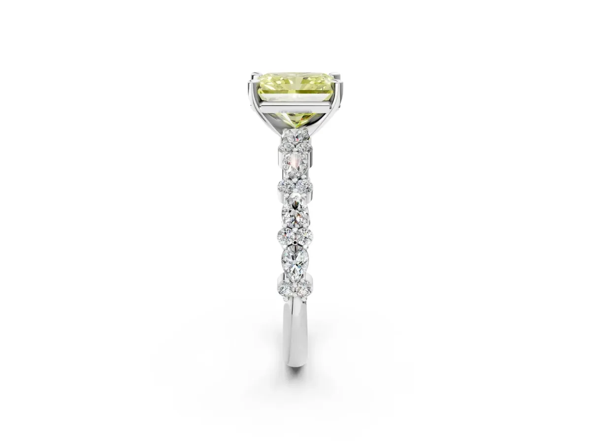 Fancy Yellow Radiant Cut Diamond Side Stone Solitaire Ring with Round and Four-Prong Setting Platinum